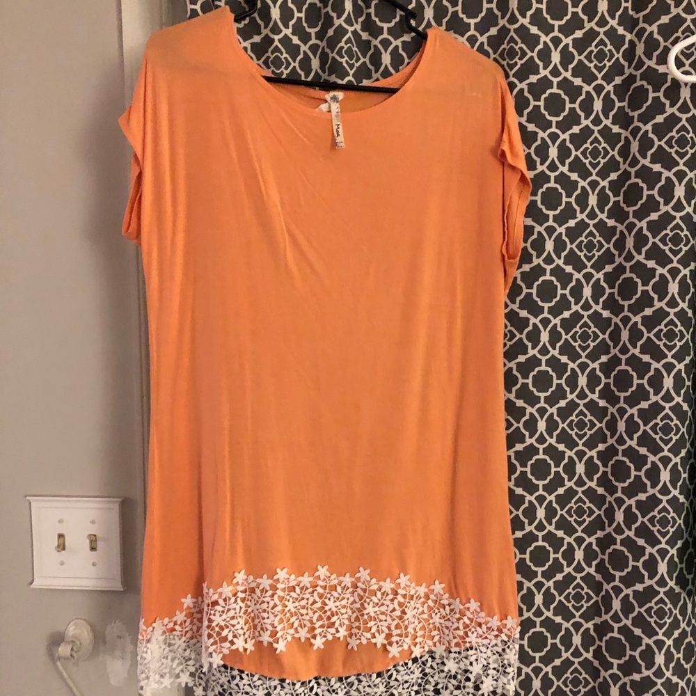 Orange shirt with lace bottom
